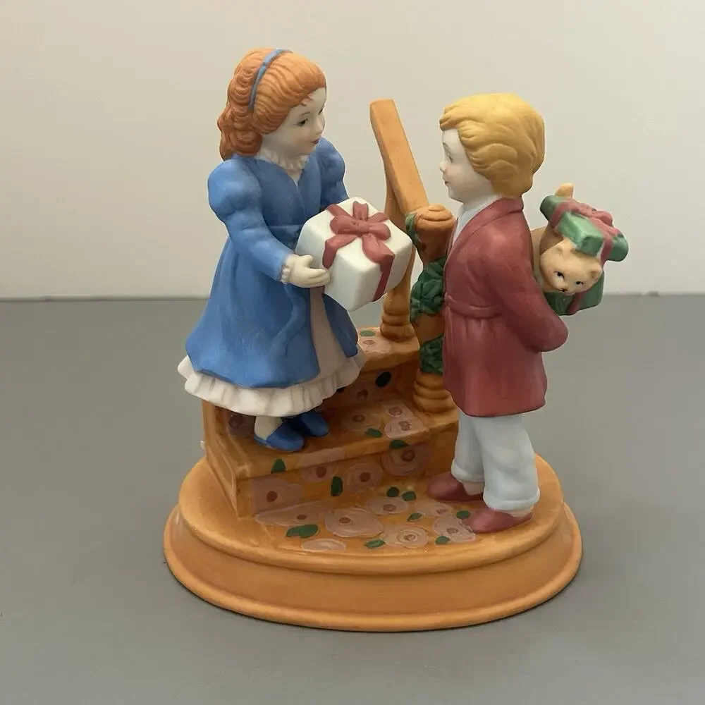 1984 Avon Christmas Memories Series Celebrating Joy Giving Porcelain Figurine
